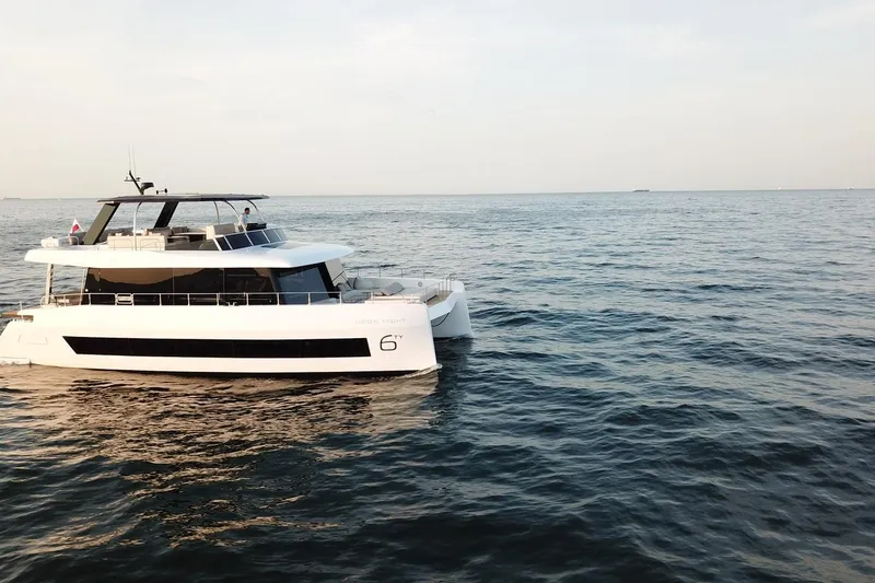 Moon 60 Power Arctic Moon Yacht Photos Pics Luxury 2025 Moon 60 Power yacht cruising on open sea.