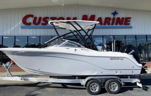 2023 Sea Fox 226 Traveler boat on a trailer at Custom Marine dealership.