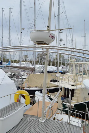 Interlude Yacht Photos Pics 1987 Grand Banks 36 Classic yacht docked among other boats in a marina.