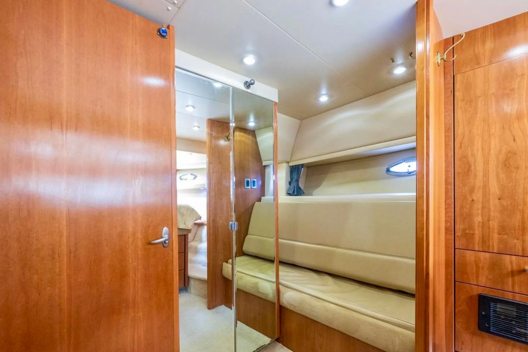 Interior of 2004 Meridian 490 Pilothouse yacht with wood paneling and seating.