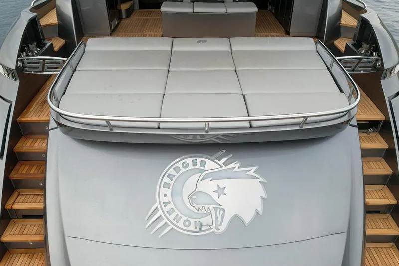 Honey Badger Yacht Photos Pics Luxury 2012 Pershing 92 yacht with spacious sunbathing area and sleek design.