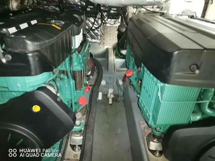 Panta Rei Yacht Photos Pics Engine room of 2022 Monachus 70 Fly yacht, featuring dual engines and complex wiring.