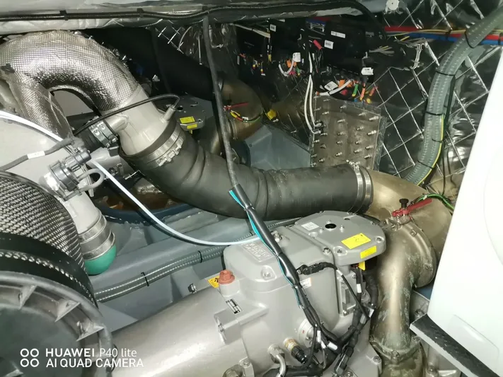 Panta Rei Yacht Photos Pics Engine room of 2022 Monachus 70 Fly yacht, showcasing complex machinery and wiring.