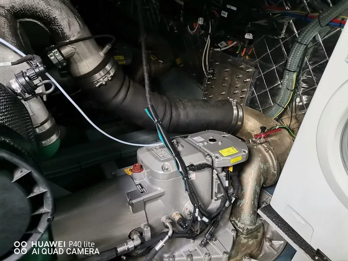 Panta Rei Yacht Photos Pics Engine room of 2022 Monachus 70 Fly yacht, showcasing mechanical components and wiring.