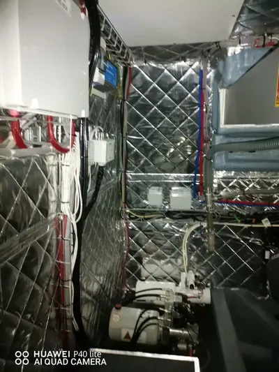 Panta Rei Yacht Photos Pics Engine room of 2022 Monachus 70 Fly yacht with metallic insulation and wiring.