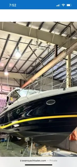 Rough Play Yacht Photos Pics 2010 Regal 600 Express yacht in indoor storage facility.