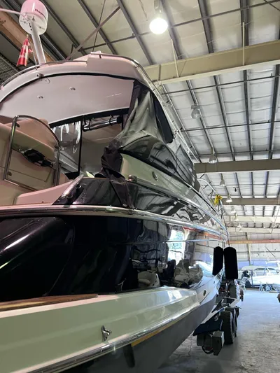 Rough Play Yacht Photos Pics 2010 Regal 600 Express yacht in indoor storage facility.