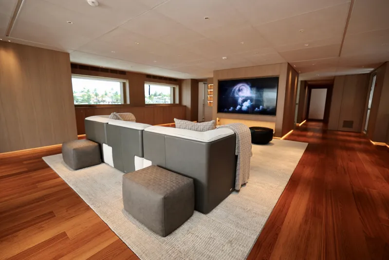  Yacht Photos Pics Luxurious interior of 2024 Rossinavi 49M Sport Yacht with modern seating and large screen.