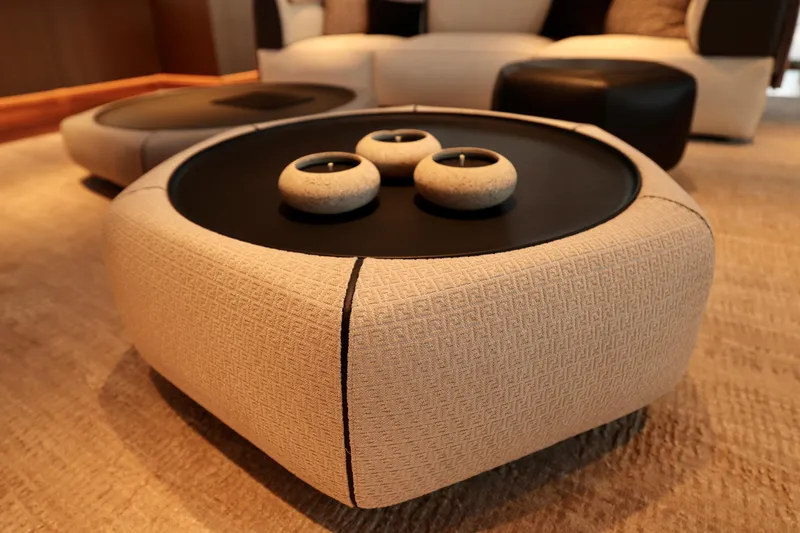  Yacht Photos Pics Luxurious interior of 2024 Rossinavi 49M Sport Yacht with elegant round table and candles.