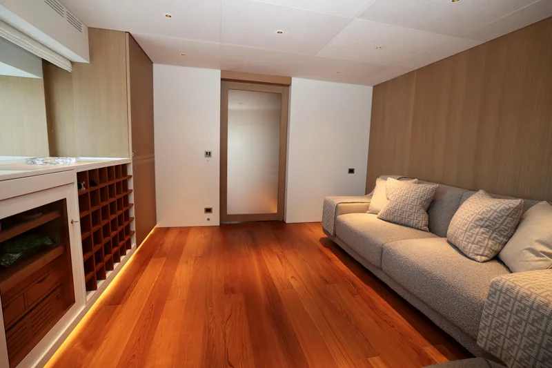  Yacht Photos Pics Luxurious interior of 2024 Rossinavi 49M Sport Yacht with elegant wood flooring and plush seating.