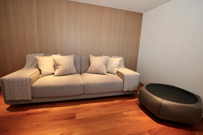  Yacht Photos Pics Luxurious interior of 2024 Rossinavi 49M Sport Yacht with elegant sofa and modern table.