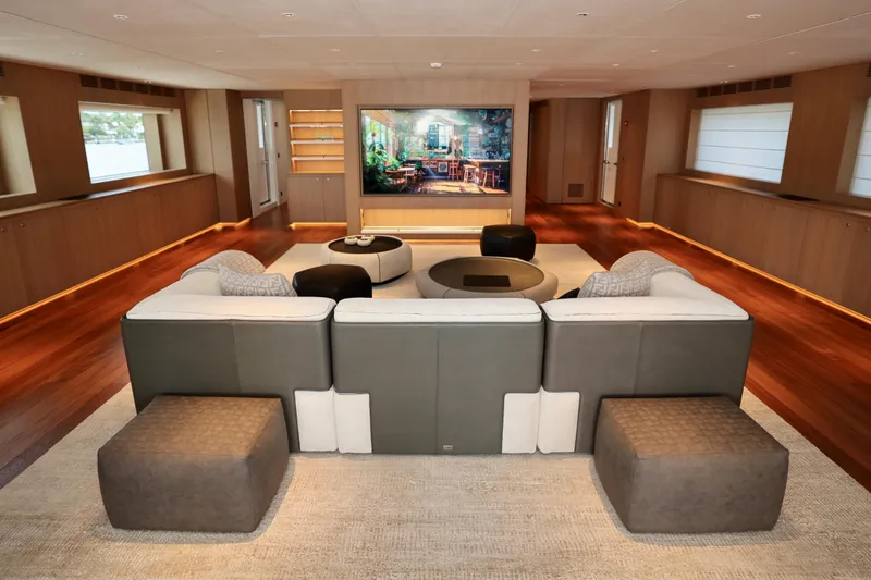  Yacht Photos Pics Luxurious interior of 2024 Rossinavi 49M Sport Yacht with modern seating and large screen.