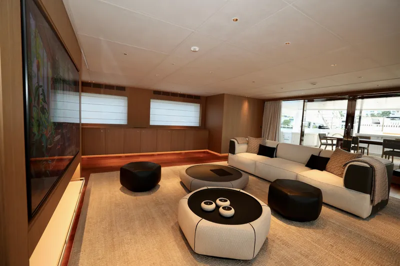  Yacht Photos Pics Luxurious interior of 2024 Rossinavi 49M Sport Yacht with modern seating and elegant decor.