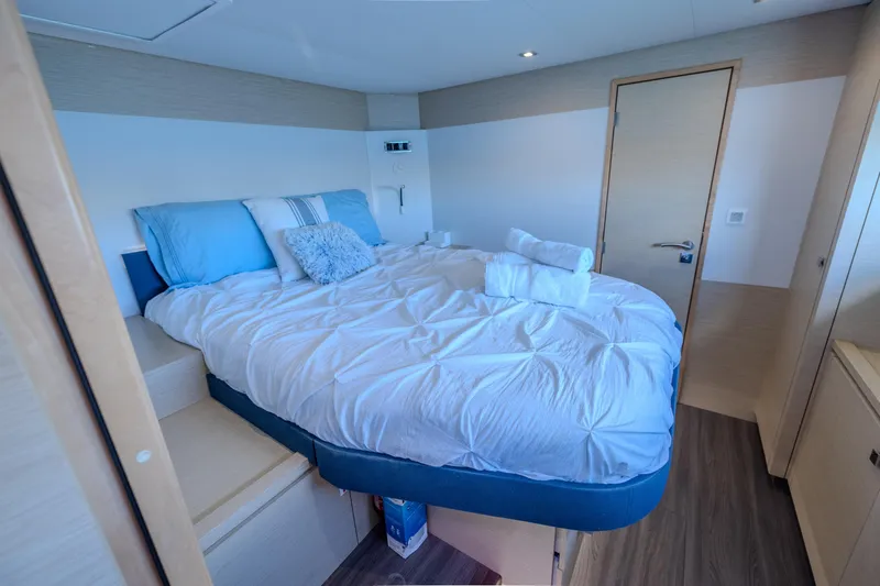  Yacht Photos Pics Luxurious bedroom interior of 2017 Fountaine Pajot Ipanema 58 yacht with cozy bedding.