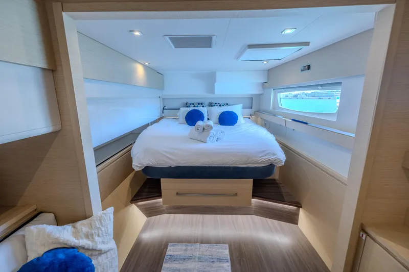  Yacht Photos Pics Luxurious bedroom interior of 2017 Fountaine Pajot Ipanema 58 yacht with ocean view.