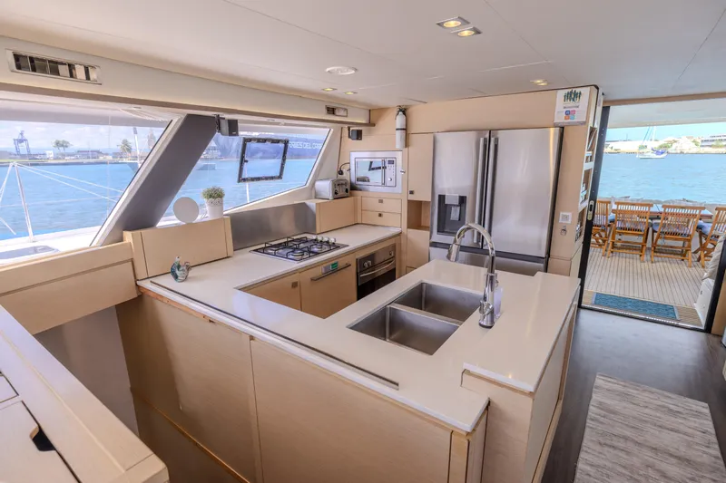  Yacht Photos Pics Luxurious kitchen interior of 2017 Fountaine Pajot Ipanema 58 yacht with ocean view.