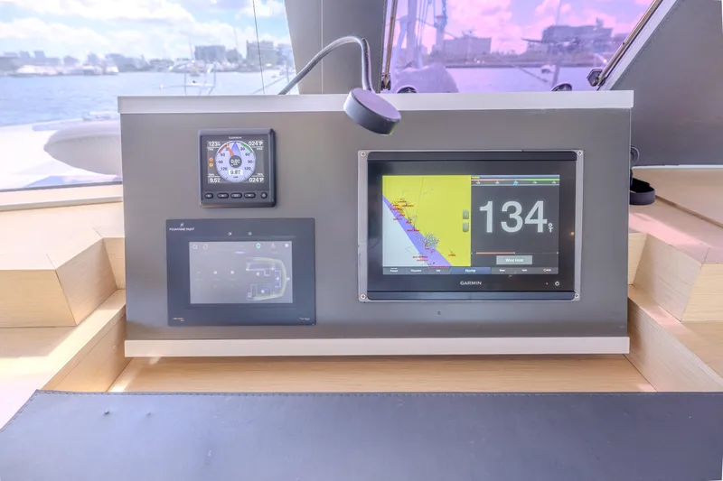  Yacht Photos Pics Control panel of 2017 Fountaine Pajot Ipanema 58 yacht with navigation displays.