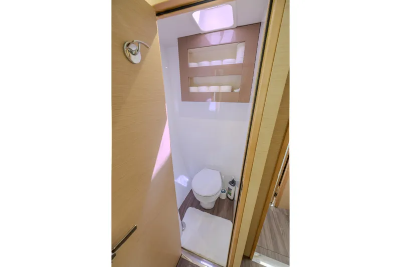  Yacht Photos Pics Bathroom interior of 2017 Fountaine Pajot Ipanema 58 yacht, featuring modern design and amenities.