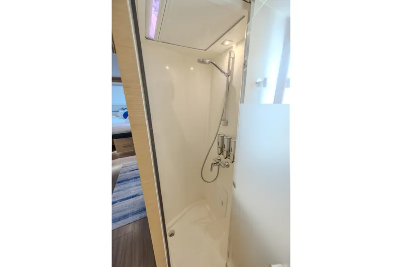  Yacht Photos Pics Shower area in 2017 Fountaine Pajot Ipanema 58 yacht, featuring modern fixtures and sleek design.