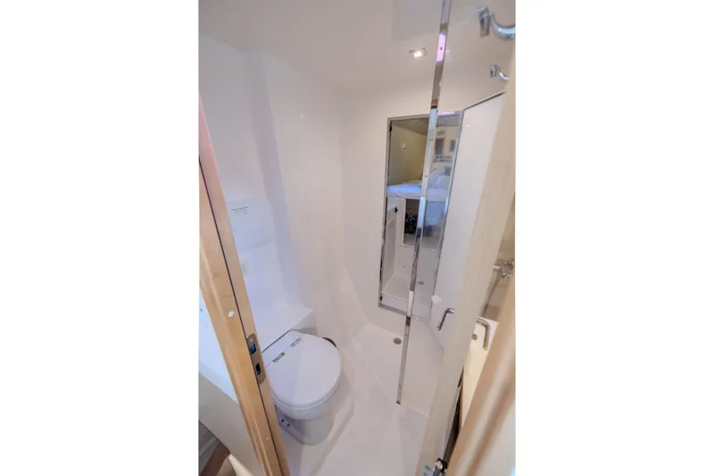  Yacht Photos Pics Bathroom interior of 2017 Fountaine Pajot Ipanema 58 yacht, featuring modern fixtures.