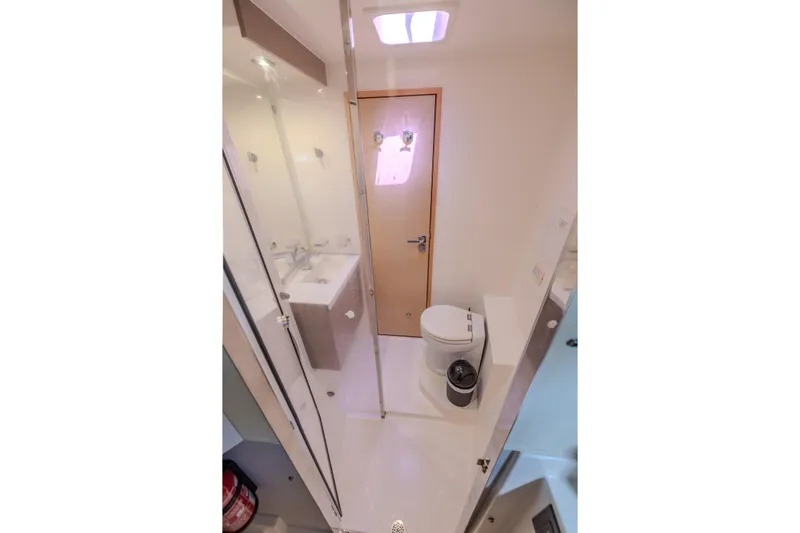  Yacht Photos Pics Bathroom interior of 2017 Fountaine Pajot Ipanema 58 yacht, featuring modern fixtures.