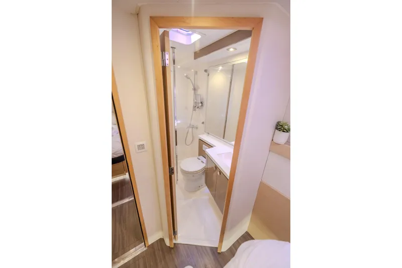  Yacht Photos Pics Luxurious bathroom in 2017 Fountaine Pajot Ipanema 58 yacht, featuring modern fixtures and elegant design.