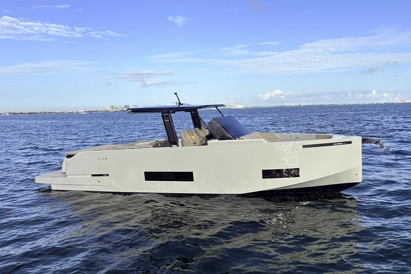 2025 De Antonio Yachts D42 @ Cancun Yacht Photos Pics 2025 De Antonio Yachts D42 luxury yacht on open water under clear blue sky.