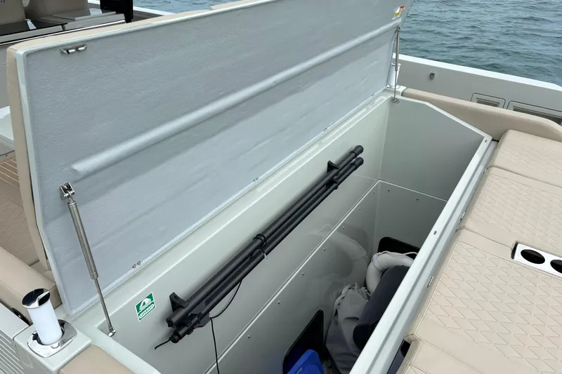 2025 De Antonio Yachts D42 @ Cancun Yacht Photos Pics 2025 De Antonio Yachts D42 storage compartment with open lid, showcasing interior space and equipment.