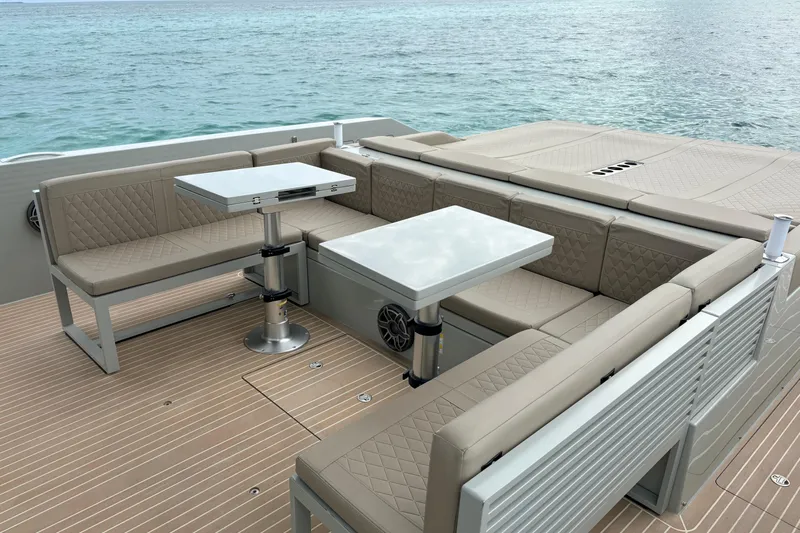 2025 De Antonio Yachts D42 @ Cancun Yacht Photos Pics Luxurious seating area on 2025 De Antonio Yachts D42, featuring elegant design and ocean view.