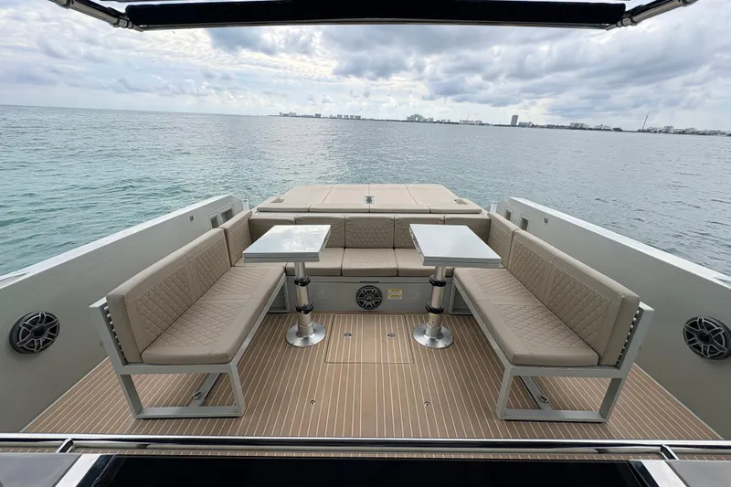 2025 De Antonio Yachts D42 @ Cancun Yacht Photos Pics Luxurious 2025 De Antonio Yachts D42 deck with elegant seating and ocean view.