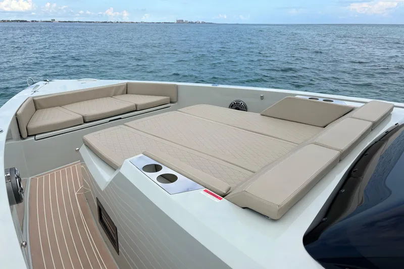 2025 De Antonio Yachts D42 @ Cancun Yacht Photos Pics 2025 De Antonio Yachts D42 with luxurious deck seating on open water.
