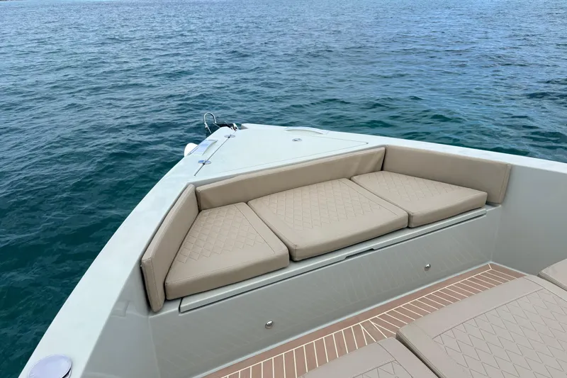 2025 De Antonio Yachts D42 @ Cancun Yacht Photos Pics Luxury seating on 2025 De Antonio Yachts D42, overlooking serene ocean waters.