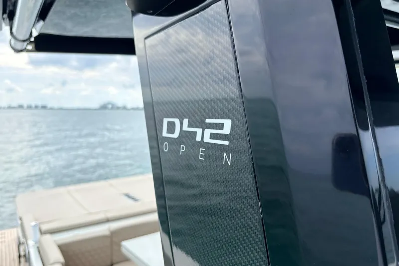 2025 De Antonio Yachts D42 @ Cancun Yacht Photos Pics 2025 De Antonio Yachts D42 Open, sleek design with ocean backdrop.