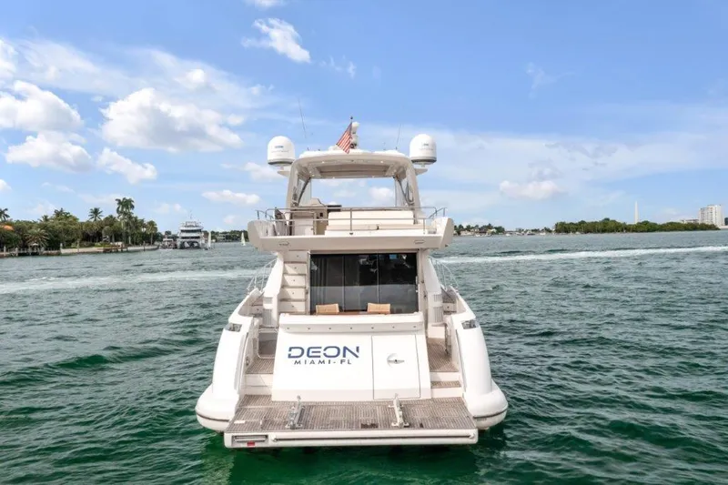  Yacht Photos Pics Azimut 64 Flybridge 2014 yacht on water, rear view, clear sky, Miami.