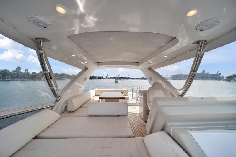  Yacht Photos Pics Luxurious 2014 Azimut 64 Flybridge yacht interior with spacious seating and scenic water views.