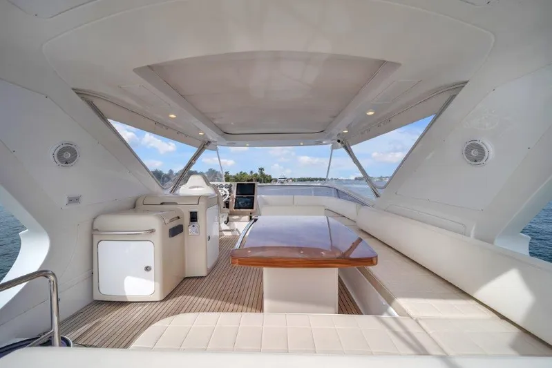  Yacht Photos Pics Luxurious 2014 Azimut 64 Flybridge yacht interior with elegant seating and ocean view.