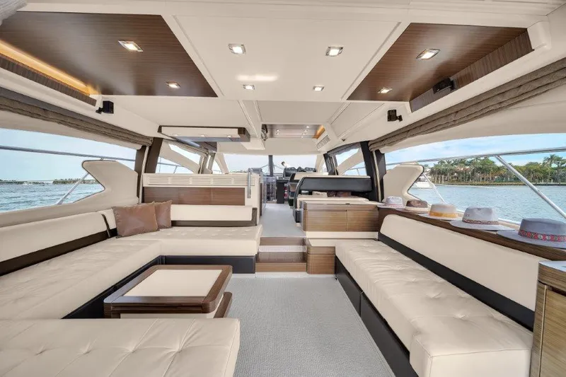  Yacht Photos Pics Luxurious interior of 2014 Azimut 64 Flybridge yacht with elegant seating and modern design.