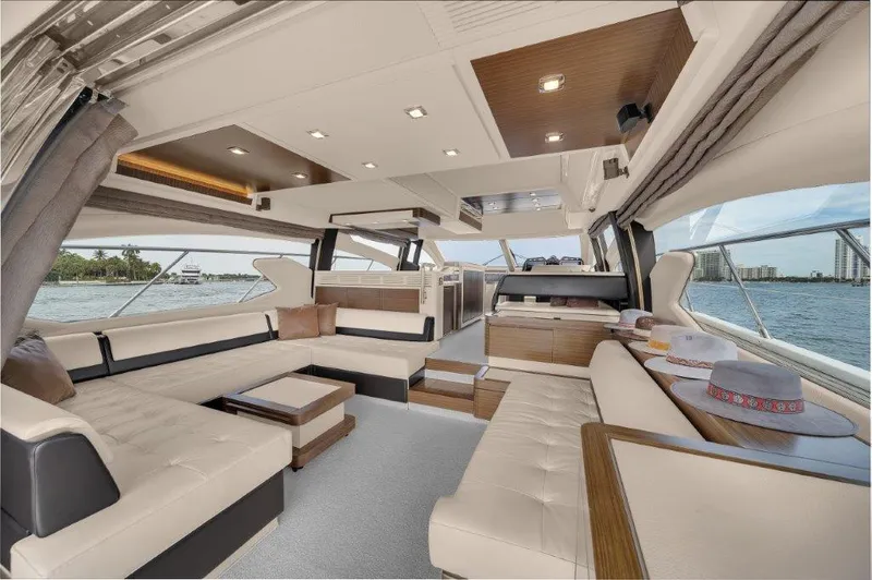  Yacht Photos Pics Luxurious interior of 2014 Azimut 64 Flybridge yacht with elegant seating and panoramic windows.