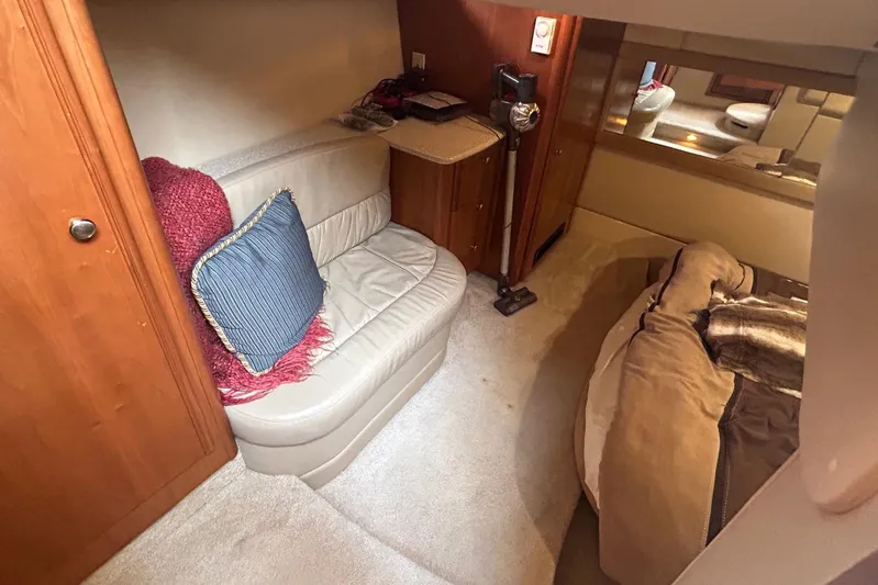  Yacht Photos Pics Interior of 2004 Meridian 411 Sedan yacht with cozy seating and elegant decor.