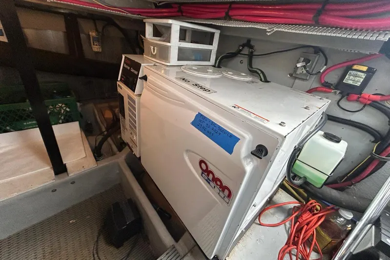  Yacht Photos Pics Engine room of 2004 Meridian 411 Sedan with Onan generator and wiring.