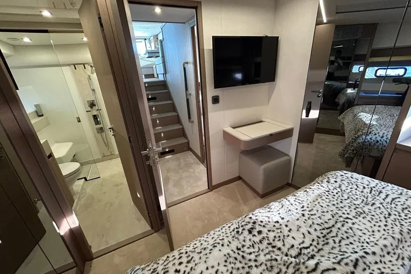  Yacht Photos Pics Luxurious interior of 2023 Prestige 590 yacht featuring bedroom, bathroom, and modern amenities.