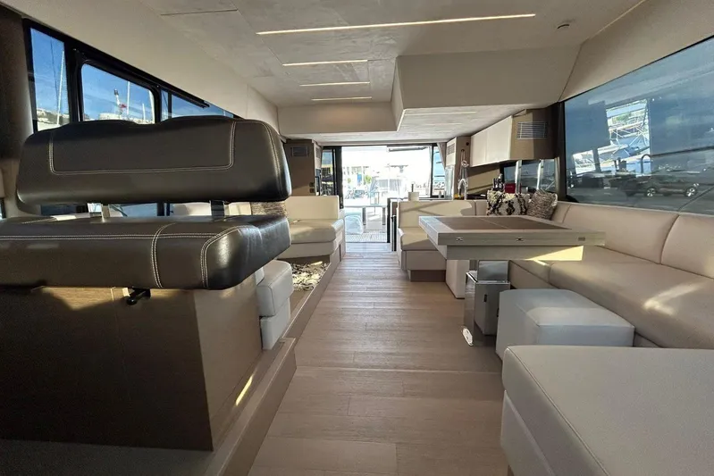  Yacht Photos Pics Luxurious interior of 2023 Prestige 590 yacht with modern seating and elegant design.
