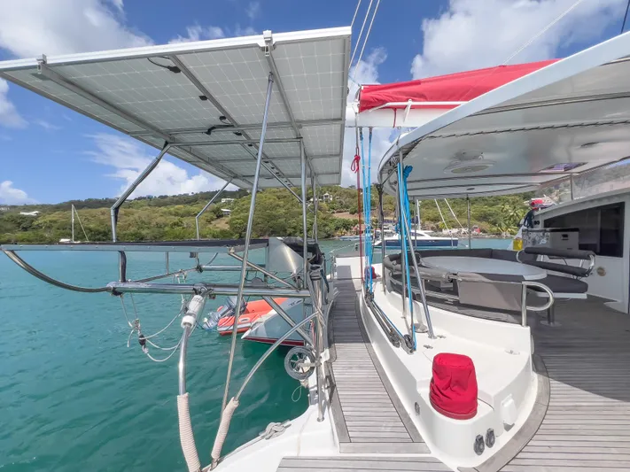 Stella Maris Yacht Photos Pics Fountaine Pajot Eleuthera 60 catamaran, 2008 model, docked in scenic turquoise waters.