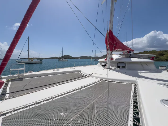 Stella Maris Yacht Photos Pics Fountaine Pajot Eleuthera 60 catamaran, 2008 model, anchored in scenic bay with clear skies.