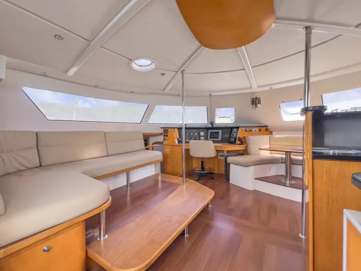 Stella Maris Yacht Photos Pics Spacious interior of 2008 Fountaine Pajot Eleuthera 60 catamaran with modern seating and navigation area.