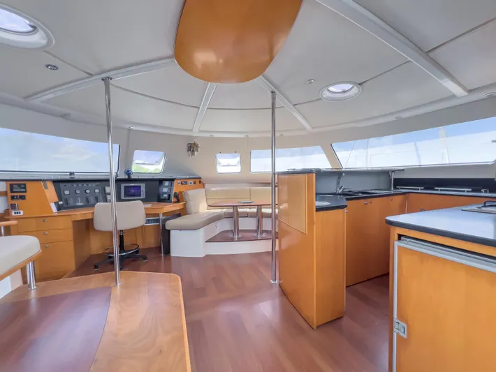 Stella Maris Yacht Photos Pics Spacious interior of 2008 Fountaine Pajot Eleuthera 60 catamaran with modern design and wood finishes.