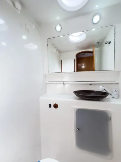 Stella Maris Yacht Photos Pics Luxurious bathroom in 2008 Fountaine Pajot Eleuthera 60 yacht with modern fixtures.
