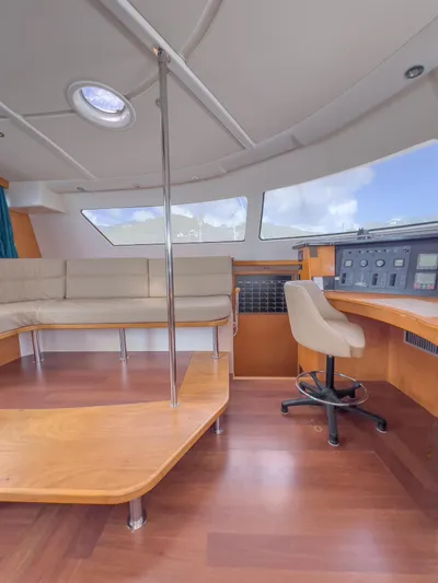 Stella Maris Yacht Photos Pics Interior of 2008 Fountaine Pajot Eleuthera 60 catamaran with seating and navigation area.