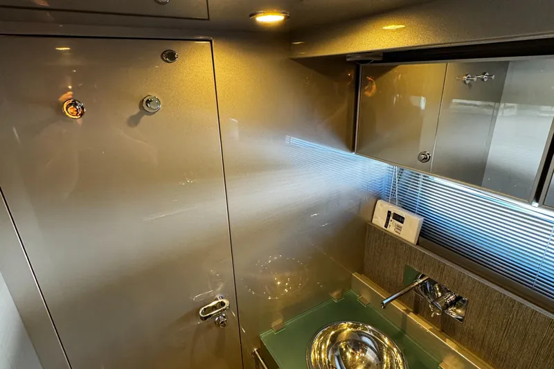 Sea Sea Yacht Photos Pics Luxurious bathroom interior of 2013 Riva Rivarama Super yacht with modern fixtures.