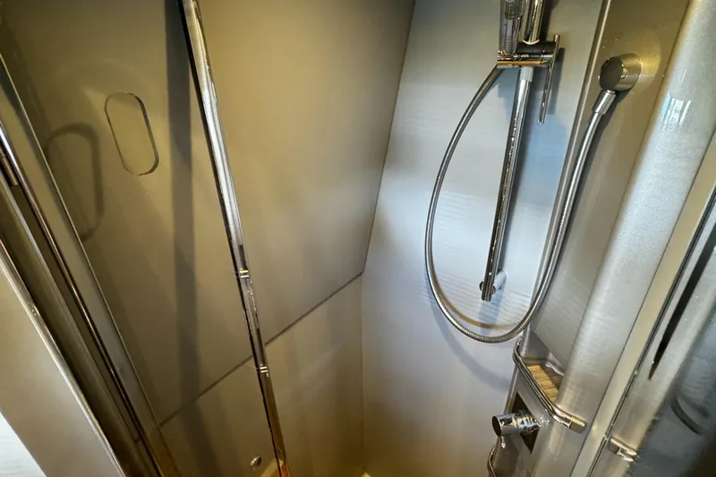 Sea Sea Yacht Photos Pics Shower area in 2013 Riva Rivarama Super yacht, featuring sleek chrome fixtures.